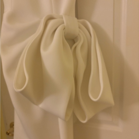 Jovani size 8 Strapless white gown with slit, side bow, and small tail. - Picture 6 of 10